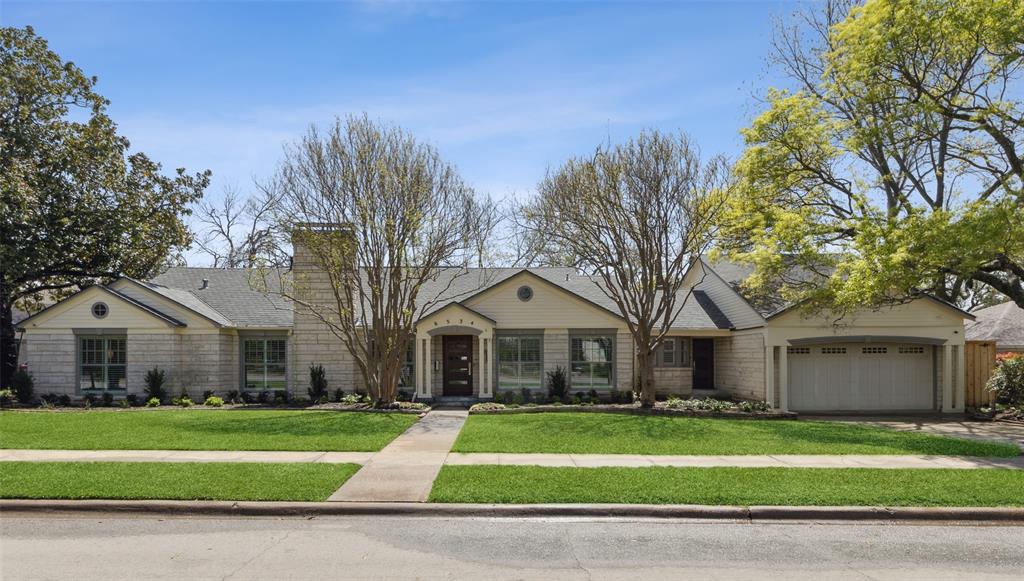 This completely updated and expanded Austin stone home located on a beautifully treed double lot in the heart of Lakewood feeds to Lakewood Elementary and boasts over 5,400 square feet of living space with sophisticated finishes and amenities.  The property offers 5 bedrooms, 5.1 baths, formals, a primary suite featuring gorgeous bath with large shower, jetted tub and marble finishes and a flexible space on the second level perfect for game room, guest quarters or large office.  The cook’s kitchen with stunning stone counters flows seamlessly into the Family room and includes Wolf range and ovens, SubZero built-in refrigerator, refrigerator drawers and a bank of wine storage with 4 full-sized chillers.  This heart of the home overlooks the expansive backyard with large pool and spa, Ipe deck and covered outdoor living space through an abundance of French doors and windows making this home perfect for entertaining and daily living!
