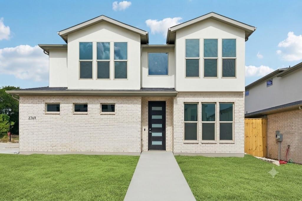 Experience elevated new construction living in Dallas with this beautifully crafted home on an oversized corner lot featuring a spacious 3-car garage in the first phase of an exclusive 73-home community. Strategically located just minutes from Downtown Dallas, the Bishop Arts District, and the future Southern Gateway Park, this home showcases custom finishes throughout and includes a builder warranty for added peace of mind. The thoughtfully designed open-concept layout offers a versatile flex room, stylish dry bar, inviting living room with a fireplace and illuminated built-ins, and a gourmet kitchen with stainless steel appliances, a gas cooktop, ample cabinetry, and generous counter space. The first-floor primary suite features vaulted ceilings and a spa-inspired en-suite bath, while upstairs you'll find a spacious game room and three secondary bedrooms with walk-in closets, including a private guest suite with its own en-suite bathroom. Bordering a scenic 20-acre park, this exceptional property perfectly blends luxury, functionality, and convenience, making it an outstanding choice for buyers searching for new construction homes in Dallas, luxury homes with custom finishes, or homes near Downtown Dallas. On Combo. Contact listing agent for access. Schedule your private tour today!