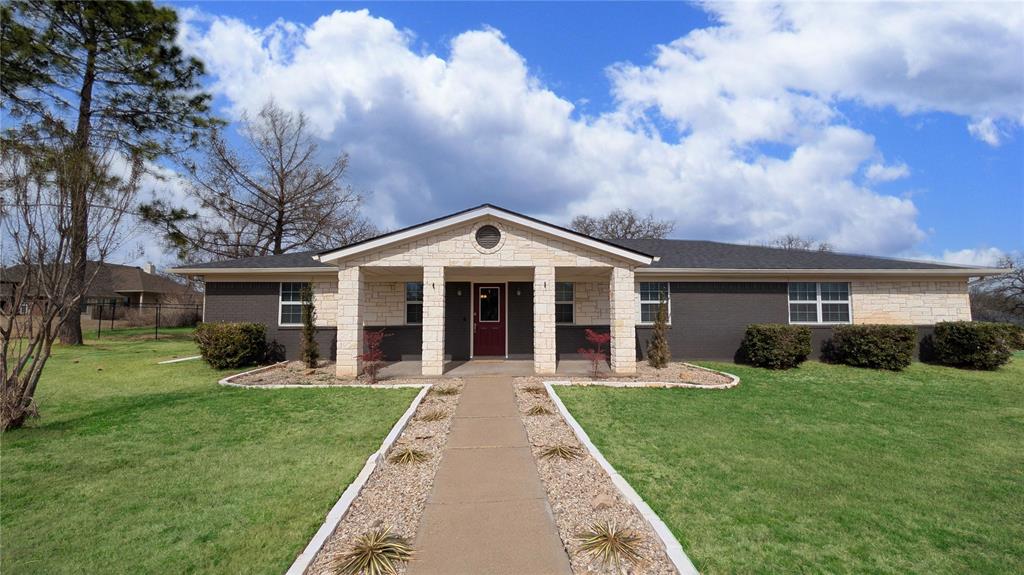 PRICE REDUCED $20,000 NOW $349,900 Spacious corner lot in the beautiful Pecan Plantation, with 2668sf of living space. 5 bedrooms, so pick which one you'd like as your home office. Sunken living room with cozy fireplace is perfect for family or when entertaining guests. Pecan Plantation is rated in the top 10 HOAs in the U.S. and is chock full of amenities, 2 golf courses, 12 tennis courts, pickleball courts. 4 beaches, riding stables. 2 resort size swimming pools, club house with restaurant and bar as well as complimentary meeting rooms, library, and so much more. Primary bedroom is huge and luxurious. Ideal layout for a large family or a multi generational family. Fenced backyard for the littles & fur babies. Deer and turkey will visit daily. Mature shade trees, gazebo patio as well as a screened in back porch. Plus a large double car garage with workspace and storage shelves. Acrylic garage floor will be installed on May 28th. And if the winds blow hard, your own private tornado shelter will keep your family safe and secure.