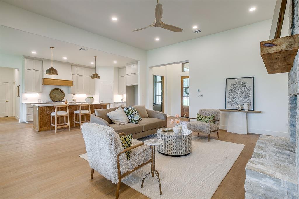 This stunning new construction home sits on 1.4 acres outside city limits—offering no city taxes and no HOA—the perfect blend of privacy and convenience. Featuring 3 bedrooms, 2.5 baths, and an oversized 3-car garage, this home is designed with both luxury and functionality in mind.

Step inside to a bright, open floor plan filled with natural light and upscale lighting fixtures throughout. The spacious living room is a true centerpiece, showcasing a floor-to-ceiling rock gas fireplace that adds warmth and character. A dedicated office with a closet provides the flexibility to be used as a home office, flex space, or even a 4th bedroom.

The oversized primary suite offers a relaxing retreat with a beautiful tray ceiling and plenty of space to unwind. The spa-like primary en suite bath features a dual tub and shower enclosure, along with a large walk-in closet. Secondary bedrooms are generously sized and connected by a convenient Jack and Jill bathroom.

Just off the main living, you’ll find a large game room complete with a spacious storage closet—perfect for entertaining or additional living space. Close by is a well appointed hallway -half bath with patio access. Perfect for any future pool plans.

Enjoy outdoor living on the oversized covered back patio, already stubbed with plumbing for a future grill or outdoor kitchen—ideal for hosting gatherings.

With modern finishes, energy-efficient construction, and room to spread out, this move-in ready home delivers the best of country living with easy access to nearby amenities.