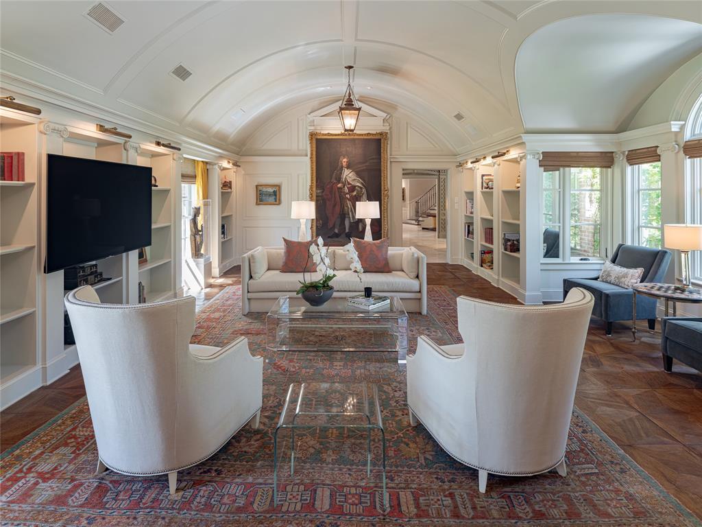 On almost an acre in the exclusive Volk Estates, this iconic residence fuses refined elegance with modern sophistication. The home was thoughtfully designed in 2012 by Spitzmiller & Norris, award winning architects responsible for Blackberry Farm. Only the highest quality of materials were used, including architectural elements imported from around the world. The incredible grounds were reimagined by Mario Nievra and feature parterres, rose gardens, oak trees, a 9 hole putting green and sprawling lawns. With every imaginable amenity, this legendary property is truly one of kind.