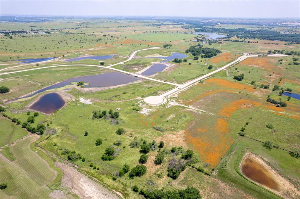 Come & build your dream home on this beautiful lot in the highly sought after Aledo ISD! Ideally located just 15 minutes to Fort Worth, 15 minutes to downtown Weatherford and 30 minutes to DFW Airport. This property offers a unique blend of natural landscapes with beautiful water features, rolling terrain, and various elevations, presenting a perfect canvas for your dream home. The property's topography provides a picturesque base for designing a home that fully utilizes the natural contours and panoramic views of the property. AT&T Internet being installed.  Propane tanks must be buried to keep the property uncluttered.

With its proximity to both Fort Worth & Weatherford, you have the convenience of city amenities like shopping, dining, and entertainment just a short drive away, while still enjoying the tranquility and privacy that country living provides.

Lakeridge Ranches offers a rare blend of convenient location and natural beauty. Don’t miss this unique opportunity!!