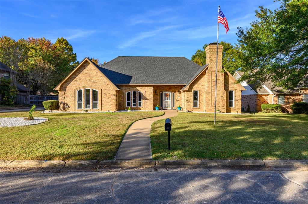 Welcome to Morningside Estates, an established neighborhood in SE Paris where you will find this renovated two-story residence sitting on third acre.  The formal entry beckons you to discover 2 living areas, 2 dining area, 2 kitchens, 4 bedrooms and 5 bathrooms, perfect for large families or multi-generational living.  Luxury vinyl plank flooring flows throughout the first floor and into the light and bright living room featuring vaulted ceiling and wood burning fireplace.  On the other side of the entry you will find the dining room leading to a spacious eat-in kitchen with granite countertops, gas range, and walk in pantry.  Just off the kitchen is a bonus room that can be a game room, 5th bedroom or office complete with half bath. The first floor Primary suite provides a peaceful escape with it’s own en suite bath featuring soaker tub, oversized shower with jets and dual shower heads, dual vanities and his and hers walk in closets.  Also on the first floor you will find an Auxiliary suite with full kitchen, private entrance, and a full bathroom with walk in shower—perfect for guests, extended family, or rental opportunity.   For your convenience there are laundry rooms both upstairs and down.  Ascend the newly carpeted stairs to the second floor and two well appointed guest rooms, separated by a jack and jill bath. Next door a large bonus room offers flexible living space for a game room, media room, or playroom.  The huge backyard is ideal for entertaining with it’s massive heated salt water pool and expansive patio surround allowing you to relax in privacy within the fully fenced yard. The home boasts many recent upgrades including new windows, interior paint, flooring and carpet, modern lighting, fans, outlets, switches, 6 panel interior and storm doors. This home combines luxury, function, and style in a desirable location just minutes from shopping, parks, and the vibrant downtown area. A perfect blend of comfort and convenience—ready for your new chapter!