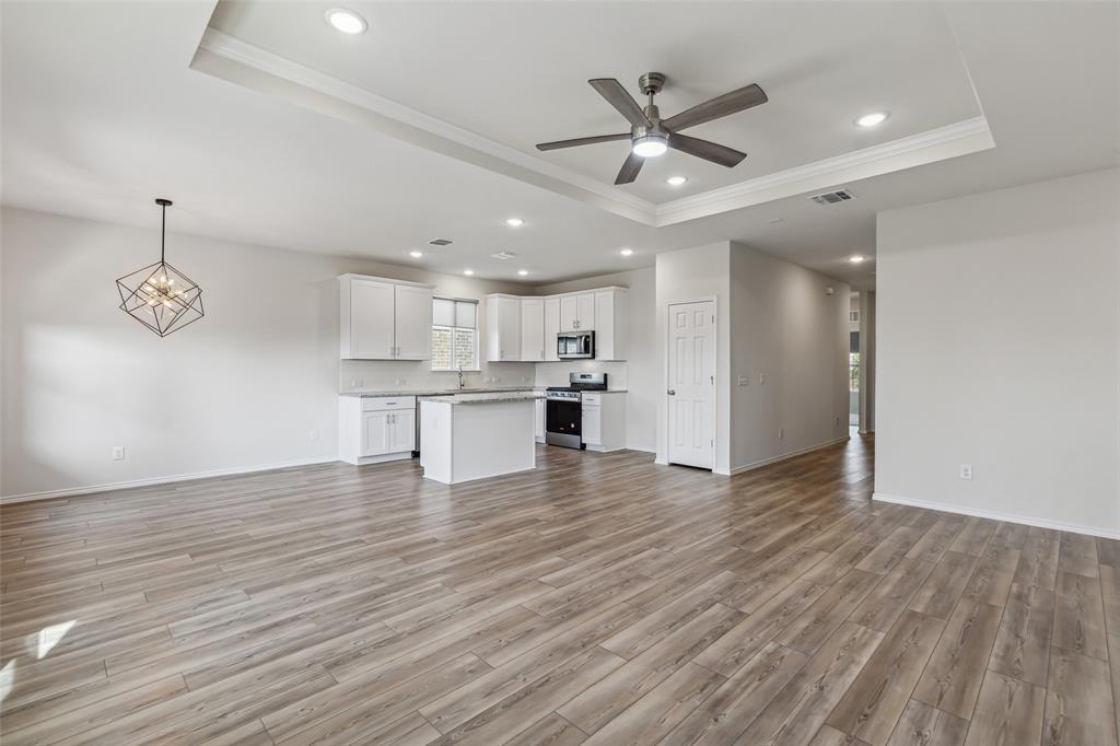 ALMOST BRAND NEW 3 BEDROOM, 2 BEDROOM, 2 CAR GARAGE, BRICK HOUSE, BACKING UP TO EXTREMELY SAFE UNITED STATES TREASURY DEPARTMENT. Inside you will find Luxury Vinyl Flooring in main areas, Carpet in Bedrooms, Fresh Paint, Ecobee Thermostat + Lots of energy efficient Low-E Vinyl Windows offering Natural Light. Open Living Area with Kitchen and Dining Area connected. Kitchen has 42 Inch White Shaker Cabinets, Granite Countertops, Stainless Steel Appliances including Gas Cooktop and oven + Dishwasher. Primary Bedroom has Ensuite Bathroom, Large Closet + Other Bedrooms also have ample closet space with access to the Laundry Room with Washer and Electric Dryer Hookup + inside entry to the 2 Car Garage. Super Quiet Fenced Backyard with no homes to ever built behind it + Covered Front and Back Porch with Curtains + Sprinkler System. Easy Access to Schools, Highways, and more. 3D Tour can be found online. Home is Available Now, Pets Allowed, Apply online by scanning QR code on the last photo.