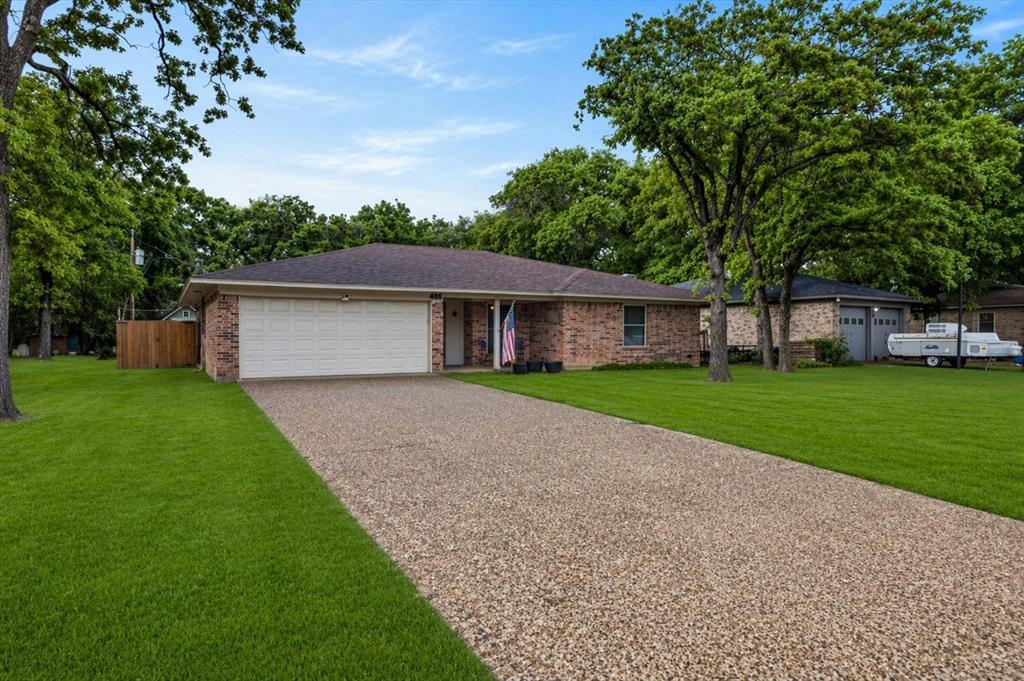 Welcome to this charming home nestled in the heart of Azle! Located at 405 Pecan Dr, this property offers the perfect blend of comfort, convenience, and small-town charm. Featuring a spacious layout, this home provides plenty of room for both relaxing and entertaining.

Step inside to find a bright and inviting living area with abundant natural light, creating a warm and welcoming atmosphere. The kitchen offers ample cabinet space and functionality, ideal for everyday living and hosting gatherings. The bedrooms are generously sized, providing comfort and privacy for the whole family.

Outside, enjoy a large yard with endless possibilities—whether you’re looking to garden, entertain, or simply unwind. The property’s location offers easy access to local schools, shopping, dining, and the scenic beauty of nearby Eagle Mountain Lake.

Whether you’re a first-time homebuyer, growing family, or looking to downsize, this home is full of potential and ready for your personal touch. Don’t miss the opportunity to make this lovely property your own!