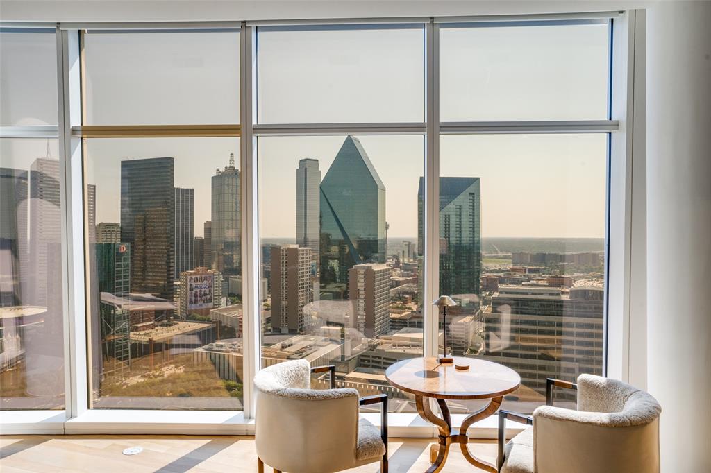 A true statement in contemporary architecture, Museum Tower anchors the Dallas Arts District as its most exclusive purely residential centerpiece. The 42-story tower sits perfectly on idyllic Klyde Warren Park. Enter your home via private elevator access and view your surroundings through floor to ceiling glass.

Gourmet kitchen includes Miele appls, beautiful marble waterfall island, custom butler’s pantry all opening to oversized living & dining areas with views of Downtown & Klyde Warren Park. Custom clad bleach oak appointments, designer wall coverings, amazing primary suite with spa-like white marble bath, custom primary closet finish out, generous size guest suite, spacious utility room, Crestron home audio sound, electronic shades, 3 premier parking spaces, & storage unit to complete this iconic contemporary architecture. Museum Tower residents enjoy five-star amenities from 24-7 concierge, valet, car service, poolside butler, owner’s lounge, terrace guest suites, and more.