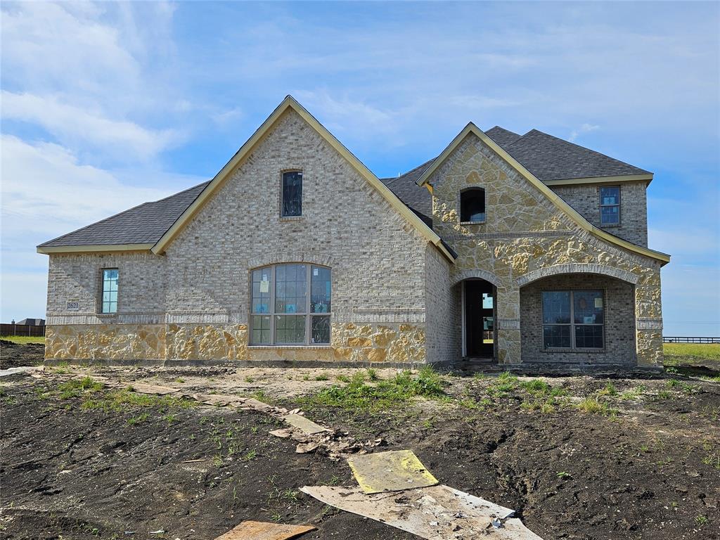 New home built by Astoria Homes on a 1 acre lot.  This home comes with the oversized 6 car Super Stall with one garage door extra wide & 9ft tall for that awesome truck you can’t fit in your current garage. Large open floor plan with real hand scraped hardwood floors, granite counter tops in kitchen and all bathrooms. Wash Happy oversized shower in primary bath. Solid maple cabinets, beautiful backsplash, matte black fixtures and 5.25 baseboard. Garage is full finished with insulated garage door, opener & epoxy floors with baseboards. Sod, Sprinkler, landscaped package in front yard and full gutters.
