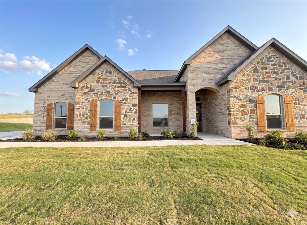 Experience the perfect blend of rustic charm and modern sophistication in this brand-new Ashlyn Home. Situated on a full 1-acre lot, this 4-bedroom, 2-bath single-family residence offers peaceful country living with no city taxes. Designed in a timeless farmhouse style, this home seamlessly combines contemporary finishes with warm, inviting details. The thoughtfully designed floor plan provides spacious living areas ideal for both everyday comfort and entertaining. Elegant bath finishes add a touch of luxury, while quality craftsmanship is evident throughout. Enjoy quiet mornings and relaxing evenings on the large covered back patio overlooking your expansive property — perfect for gatherings, gardening, or simply taking in the open space. If you're looking for new construction, modern design, and the freedom of country living, this beautiful Ashlyn Home delivers it all. Buyer and buyer’s agent to independently verify all information including room dimensions, schools, taxes, HOA details, and restrictions.