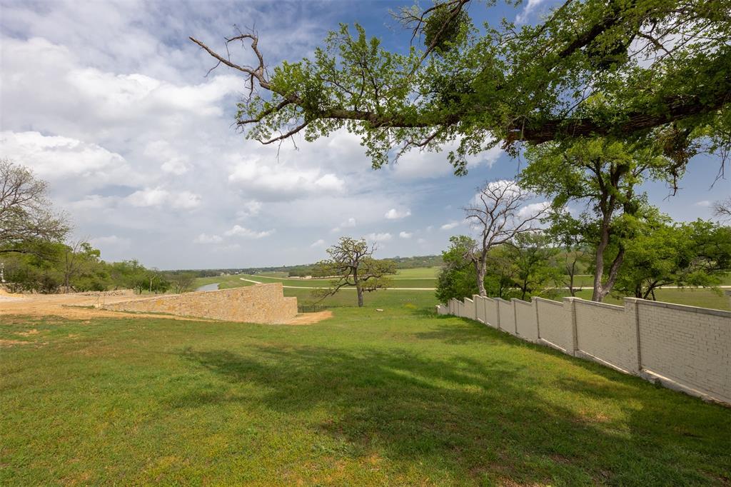 Seller Financing Available to Qualified Buyers One of the last two remaining opportunities in the sought-after, gated Rivercrest Bluffs neighborhood, this exceptional lot offers a rare chance to build your dream home in an idyllic, serene setting. Nestled at the end of a cul-de-sac, this premium property is flanked by a gorgeous, untouched park on its right side—ensuring privacy and unobstructed views. Backing directly to the Trinity River, you'll enjoy breathtaking vistas of green spaces and blue water, creating a peaceful and picturesque backdrop. What sets this lot apart is the unbeatable location. Across the river, property is protected from future development, ensuring these sweeping views will remain uninterrupted for years to come. With nature surrounding you, the feeling of being nestled in the countryside is ever-present, yet you're just minutes from the excitement that Fort Worth has to offer. From world-class dining, shopping, and entertainment to renowned museums and cultural attractions, everything you need is within easy reach. This lot presents a unique blend of tranquility and convenience, offering a rare opportunity to create a private sanctuary in the heart of one of Fort Worth's most coveted communities. Don’t miss your chance to own a piece of paradise at Rivercrest Bluffs—schedule a tour today to explore the beauty and potential of this incredible property!