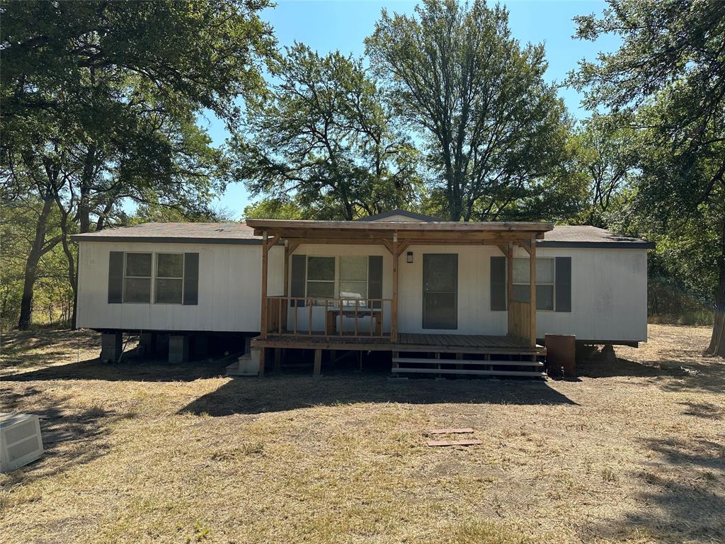 This is a MUST see! Affordable Mobile home in an almost 5 acre land! Huge land for lots of privacy. 3 beds and 2 full baths. Well maintained and AC fixed 2023. *Sold as is*

Don't miss this once in a lifetime opportunity!