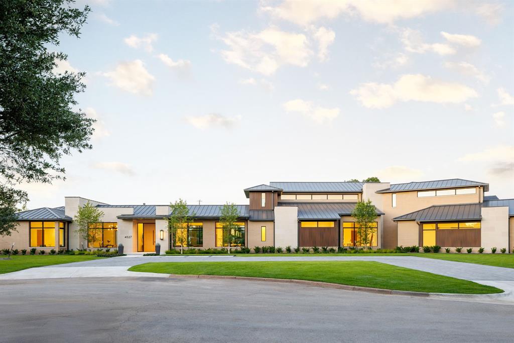 Designed for modern living, this newly constructed contemporary residence in sought-after Preston Hollow showcases exceptional designer finishes and thoughtful craftsmanship throughout. The gourmet kitchen is outfitted with top-of-the-line stainless steel appliances, quartzite countertops, custom cabinetry, and a striking waterfall-edge island—perfect for both everyday living and entertaining. Walls of windows flood the open-concept living spaces with natural light, accentuating the home’s clean lines and refined aesthetic.

The serene primary suite offers a true spa-like retreat with dual vanities, a soaking tub, glass-enclosed shower, private sauna, and two generous walk-in closets. Multiple living areas provide flexibility for formal gatherings or relaxed daily living. Outdoors, enjoy a resort-style backyard complete with a stunning pool, hot tub, and fire pit—an ideal setting for year-round relaxation and entertaining.