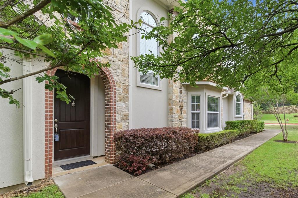 Discover one of Grapevine’s best-kept secrets in this secluded Townhome community tucked beside the renowned Cowboy Golf Club. This desirable neighborhood sells quickly, so now is your chance! Built by Toll Brothers, this one owner home is nestled in a Private Gated neighborhood offering security, serenity, and a limited collection of beautifully designed residences.  Even within this exceptional setting this gem is poised and perfectly positioned at the 4th hole.  This thoughtfully planned home offers a smart and functional floor plan with the ideal balance of comfort and privacy. Relax on the covered patio and enjoy peaceful golf course views as players pass by, or step out to explore the many walking trails that wind throughout the community and surrounding golf course grounds. Inside, the home features elegant finishes along with abundant practical storage rarely found in Townhome living. The garage is enhanced with a slotted wall system providing flexible storage solutions to maximize organization and utility. Additional garage shelving is just the beginning.  Be sure to check out the additional closet in the utility room and the under-stair space with more built-in shelving!  The HOA provides lawn care and exterior maintenance, creating a true lock-and-leave lifestyle. If travel calls, you can leave home with confidence knowing the community is beautifully maintained while you enjoy the convenience of nearby DFW International Airport. Invite family and friends, parking is no problem!  An extended driveway and convenient guest parking located directly across the street means easy access. Grapevine Mills Mall—with its shopping, dining, and entertainment—is just up the hill, while charming Historic Downtown Grapevine, known for its local events and welcoming atmosphere, is only minutes away. This is a rare opportunity to enjoy low-maintenance living in one of Grapevine’s most desirable hidden enclaves.