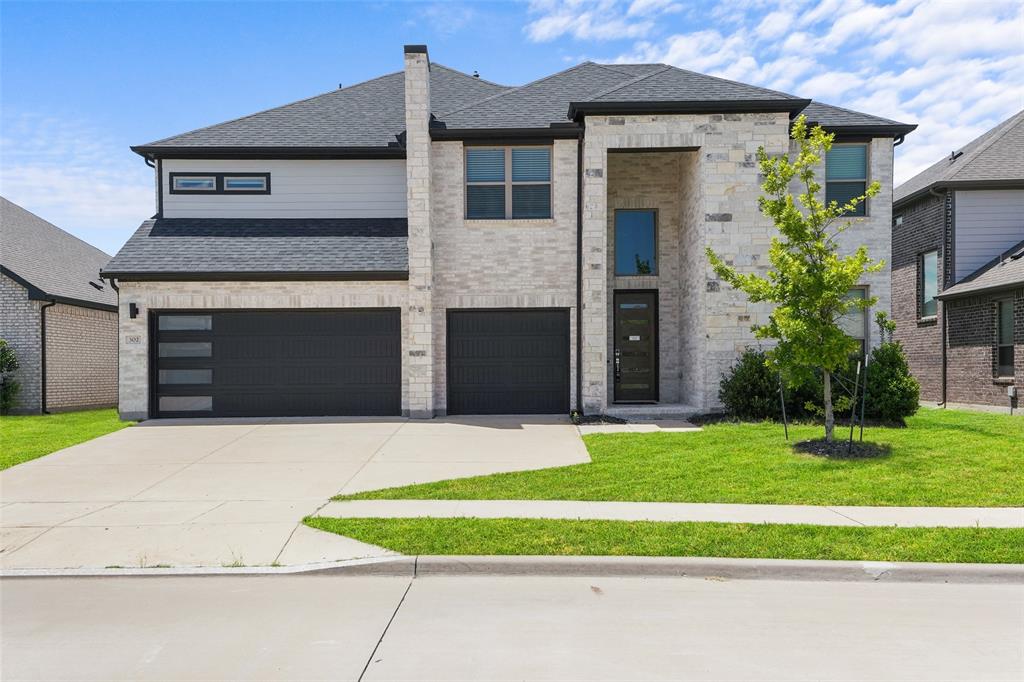 Step into modern luxury and exceptional space in this stunning two-story home located in one of Lavon's most sought-after master-planned communities. With soaring ceilings, designer finishes, and an open-concept layout, this home offers the perfect blend of style, comfort, and functionality. The impressive living room welcomes you with dramatic vaulted ceilings, walls of windows that flood the space with natural light, rich wood flooring, and a sleek electric fireplace that creates a striking focal point. The chef-inspired kitchen is equally impressive, featuring quartz countertops, a large center island, custom cabinetry, stainless steel appliances, gas cooktop and abundant storage, perfect for entertaining or everyday living. Retreat to the spacious primary suite, complete with a spa-like bath featuring dual vanities, oversized walk-in shower, private water closet, and an expansive walk-in closet. Upstairs, you'll find generously sized secondary bedrooms, beautifully appointed bathrooms, and flexible living space ideal for a game room, media room, home office, fitness area, or multi-generational living. The home's contemporary color palette, high ceilings, oversized windows, and thoughtful design create a bright and inviting atmosphere throughout. Every detail has been carefully selected to provide both elegance and practicality. Outside, enjoy a low-maintenance backyard and access to outstanding community amenities, including a resort-style swimming pool, parks, walking trails, green spaces, and gathering areas. Conveniently located near schools, shopping, dining, and major commuter routes, this home offers easy access to everything North Texas has to offer while maintaining the charm of small-town living. Why wait to build when you can move into a home that already offers the upgrades, space, and modern finishes today's buyers are searching for? Experience the perfect combination of luxury, convenience, and community at 302 Coyote Creek.