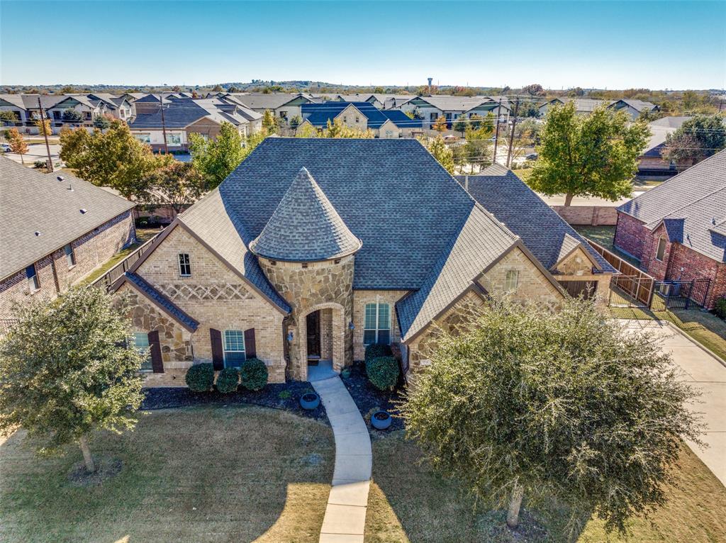 Welcome to this stunning single-story custom home, featuring timeless curb appeal with its stone façade, turret-style entry, and elegant architectural details. Offering 3,500 sq ft of well-designed living space, this home delivers the perfect blend of charm, comfort, and functionality. Inside, you’ll find 4 spacious bedrooms, 3 full bathrooms, a dedicated home office, and a large bonus room that can serve as a game room, second living area, media room, or even a 5th bedroom if needed. The open layout brings in plenty of natural light and creates an inviting flow for both everyday living and entertaining. Built in 2014, this property provides modern features while maintaining classic European character. As a single-story, it offers effortless accessibility and convenience perfect for families or anyone wanting to avoid stairs. Located close to the schools, this home sits in a highly desirable neighborhood with easy access to nearby amenities, making it a rare find that checks all the boxes.