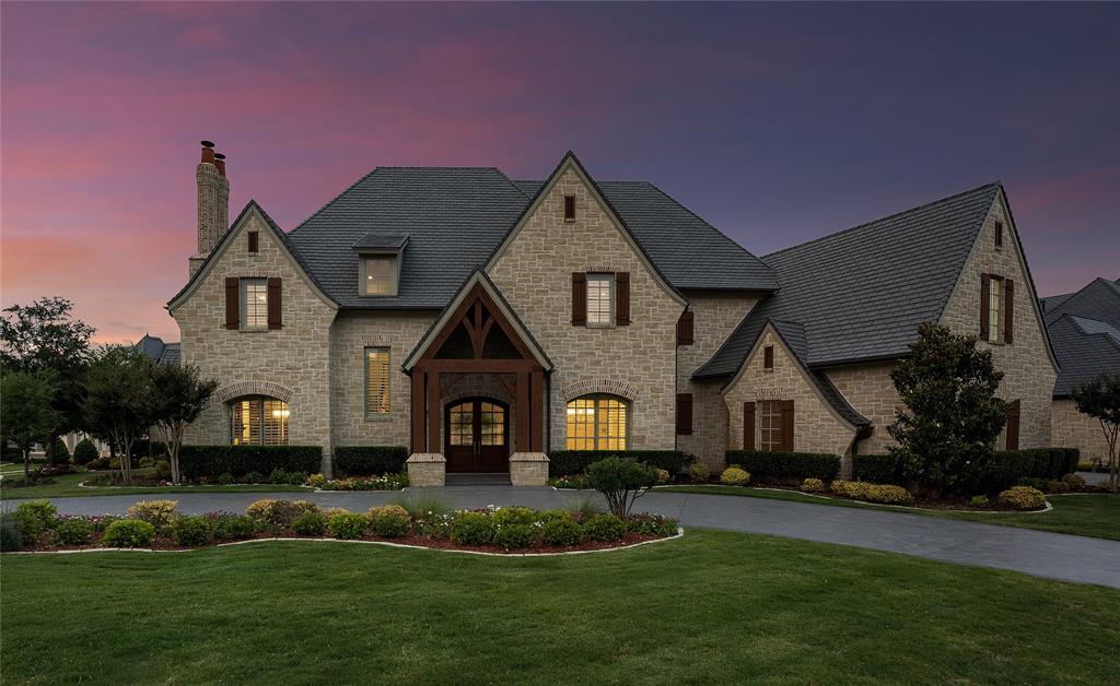 This exquisite Sharif & Munir traditional design offers unparalleled luxury & convenience. Positioned on a corner, wooded creek lot along Caddo Trail is the first ever opportunity to acquire an existing home in The Bluffs at Chapel Creek Estates. Experience towering ceilings, rich woods & natural light-kissed spaces. The chef's kitchen offers 2 ovens, dual islands, Sub Zero fridge, Wolf range, 2 Miele dishwashers & enormous pantry. The serene primary offers a sitting area overlooking the picturesque pool & trees. Upon waking, pass the in-room coffee bar on your way to your private his & hers baths each w spacious closet. 4 additional bedrooms are ensuite. Entertain in style in the den w wet bar just beyond the wine room or outside at the pool or fireplace under the 500sf veranda. This stunning property seamlessly blends indoor & outdoor living spaces for a resort-like feel moments from The Star, PGA, ballparks & all the entertainment, retail & dining the City of Frisco has to offer.