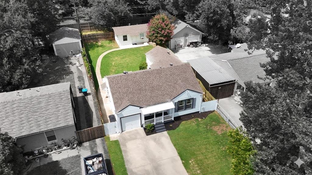 Take advantage of LENDER PROVIDED 1-year RATE BUYDOWN. Potential SAVINGS of up to $200 per month for the first year of ownership!! Welcome to 4212 Geddes Ave. — a beautifully updated home with a FULLY EQUIPPED 300 SQFT GUEST HOUSE, nestled in the heart of Fort Worth just MINUTES from the cultural district, dining, and shopping! Whether you need space for multigenerational living, rental income, or a home office, the GUEST HOUSE IS A TRUE BONUS — complete with its own private entrance, kitchenette, full bathroom, stackable washer & dryer connections, and updated PEX plumbing. With SEPARATE ELECTRIC AND WATER METERS, each structure is fully independent, offering unmatched flexibility and VALUE! Guest house is currently rented at $600 per month! Step inside the main home to discover kitchen featuring SLEEK QUARTZ COUNTERTOPS and BRAND NEW LVP FLOORING, while the bathrooms are updated with stylish tile, newer tubs, and quality fixtures. Enjoy the warmth of REAL WOOD FLOORING THROUGHOUT — NO CARPET ANYWHERE!! Major systems have been thoughtfully updated for peace of mind: Exterior updated include the entire home being freshly painted in 2025 with durable, long-lasting BEHR PAINT, FOUNDATION REPAIRS COMPLETED IN 2024, newer HVAC units (outside in 2014, inside in 2016), a 2017 ROOF WITH HEAVY-DUTY SHINGLES installed by Lon Smith Roofing, and modern PEX PLUMBING LINES. The home is ALL-ELECTRIC for cleaner indoor air — NO GAS, NO BENZENE — with the gas line professionally sealed! ENERGY EFFICIENCY shines with newer DOUBLE-PANE WINDOWS, and the CONCRETE BACK PORCH offers a blank slate for your dream outdoor living space! Additional highlights include a NEW WATER HEATER, INCLUDED WASHER & DRYER, MAIN KITCHEN FRIDGE, and a convenient WALK-IN SHOWER! Don’t miss this RARE opportunity that blends CHARACTER, COMFORT, AND INCREDIBLE VERSATILITY!!