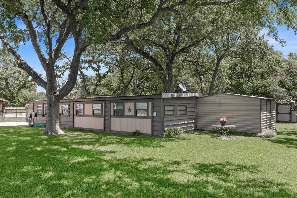 Charming all electric 1-bedroom, 1-bath home offering both comfort and convenience. Featuring a nice yard with water well and a lawn sprinkler system, this beautifully landscaped lot is highlighted by the St. Augustine grass and nice shade trees.  The well-maintained home is centrally cooled and heated and includes all appliances, a metal roof, a 12x16 storage building, a backyard patio cover and a metal 2-car carport with a concrete floor and paved driveway.   Great location, priced to sell and move in ready!!  Call us to see it!!