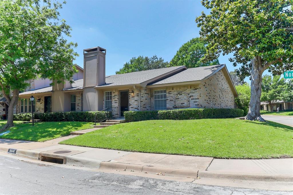Beautifully maintained one-story townhouse offering a spacious open layout, mature trees, and fantastic curb appeal. This charming home features a striking brick fireplace, lush landscaping, and abundant natural light throughout. Enjoy low-maintenance living with generous living spaces, a welcoming front entry, and a peaceful neighborhood setting. Conveniently located near shopping, dining, major highways, and everyday conveniences. Perfect for buyers seeking comfort, character, and easy living in a highly desirable area.