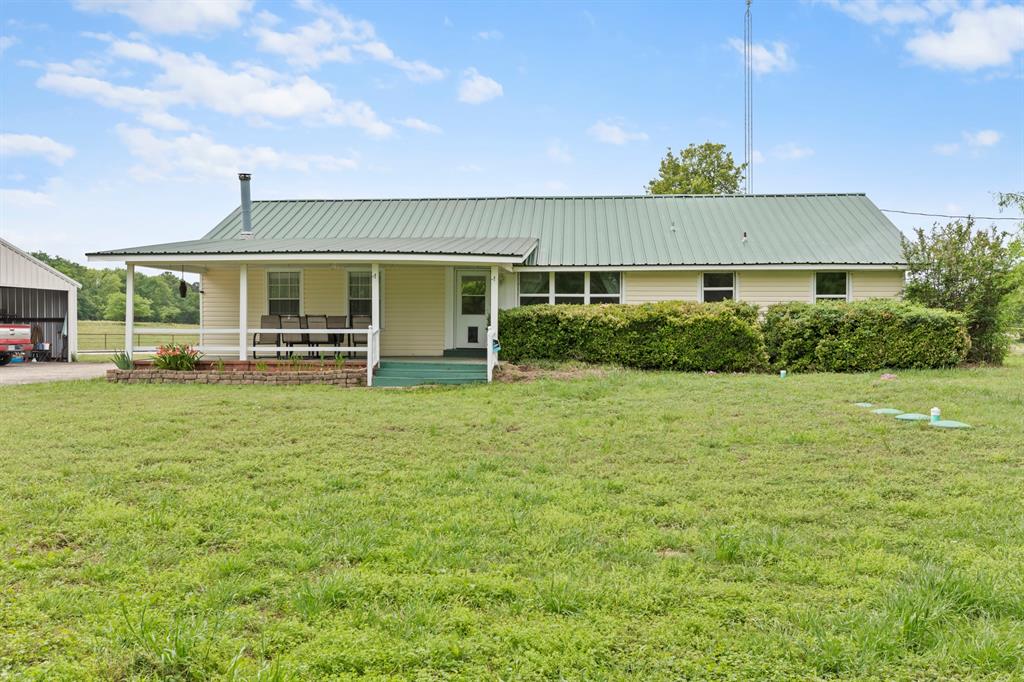 Discover the perfect blend of East Texas charm and wide-open space with this beautiful ranch-style property situated on approximately 32.4 acres in Big Sandy. This single-family home offers a peaceful setting surrounded by a mix of pasture and natural landscape, ideal for those seeking privacy, recreation, or agricultural use. Inside, you’ll find a thoughtfully designed layout featuring a split primary bedroom, multiple living areas including a den and family room, and vaulted ceilings that create an open, airy feel. The home is equipped with energy-efficient features such as foam insulation, double-pane windows, and a programmable thermostat, helping maintain comfort year-round. A combination of modern touches like smart home features and classic elements make this home both functional and inviting. Whether you're enjoying quiet evenings on the covered porch or taking in the scenic views, this property delivers a true country living experience.

Outside, the land offers endless possibilities with fencing already in place and ample room for livestock, recreation, or future improvements. A security gate provides added privacy, while outdoor features like an open patio and covered deck create ideal spaces for entertaining or relaxing. The property is serviced by an aerobic septic system and offers the space and flexibility to expand, build additional structures, or simply enjoy the natural beauty of East Texas. With over 30 acres, this property provides the perfect balance of usability and privacy, all while being conveniently located just minutes from Big Sandy. This is a rare opportunity to own a versatile acreage property with space, comfort, and potential all in one.