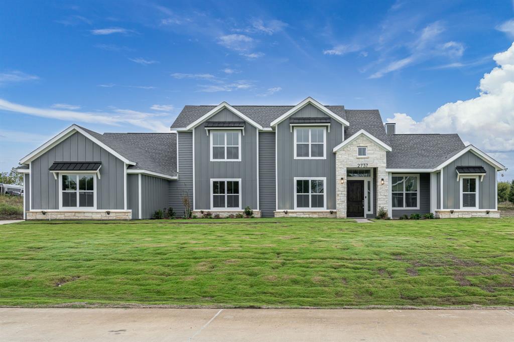 Come home and romanticize life as you unwind your day in the dual entry oversized luxury shower or sit and soak in the deep tub as you take the handle of stress and wash them away in total relaxation.  With two master closet the size of children bedrooms you deserve your space on 1.3 acres with an extended covered patio that will have you in the outside in the shade of life.  A home like this brings you peace and it’s a great foundation to build the life you always wanted.  Not only does this home create the atmosphere for you and your family becoming the greatest self versions of yourself but enjoy that the community is free of HOA, mud taxes and pids lower taxes means you get to keep more of your money to invest in whatever you desire.  Side entry 3 car garage with an EV charger, that appeal to some but can also help resale value.  You deserve a home like this so let’s get you home. High trey ceilings, open floorplan 2nd floor gameroom extra bedroom and full bath, spacious kitchen with window sink the microwave has air fryer feature. Big beautiful windows to brighten your day throughout the family room.