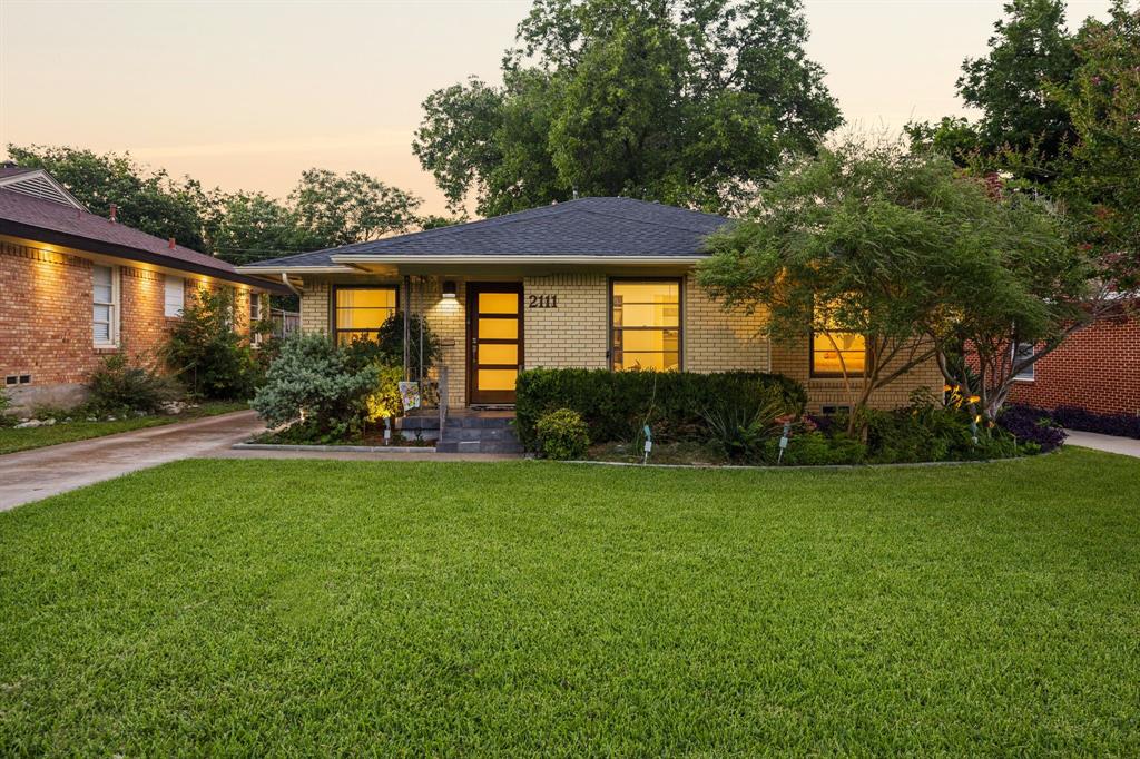 Located in the highly desirable Elmwood neighborhood, this classic brick home blends timeless character with thoughtful modern updates. The functional floor plan offers an open feel, spacious room sizes, excellent flow, and abundant natural light throughout. The updated kitchen opens to the dining area and features butcher block countertops, crisp white subway tile, and recessed dimmable lighting. Original hardwood floors have been beautifully refinished, while matching hardwoods in the kitchen create a seamless look. The low-maintenance backyard is finished with synthetic turf for year-round enjoyment and water conservation. The upgraded garage features sheetrock, insulation, epoxy flooring, and a quiet, energy-efficient mini-split HVAC system, adding flexibility for storage, hobbies, or workspace needs. A wonderful opportunity to enjoy the charm, character, and convenience that make Elmwood one of Dallas' most beloved neighborhoods.