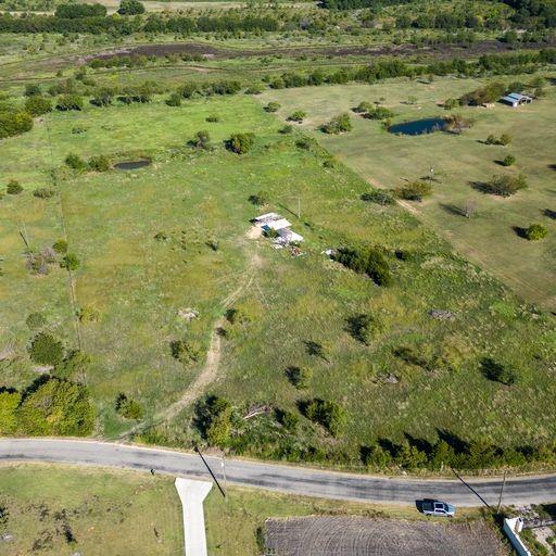 They're not making anymore land so don't let this opportunity pass. Beautiful 10Acre lot in highly ranked Palmer school district. Perfect property to build your dream home, It would be a great piece for family to split and build additional home for their children or parents. Property is perfect for commuters since it has easy access on & off of I-45. The property also has a pond. Schedule your showing today! this land will offer more than you need to fulfill your desire. This property also has the potential to produce hay.