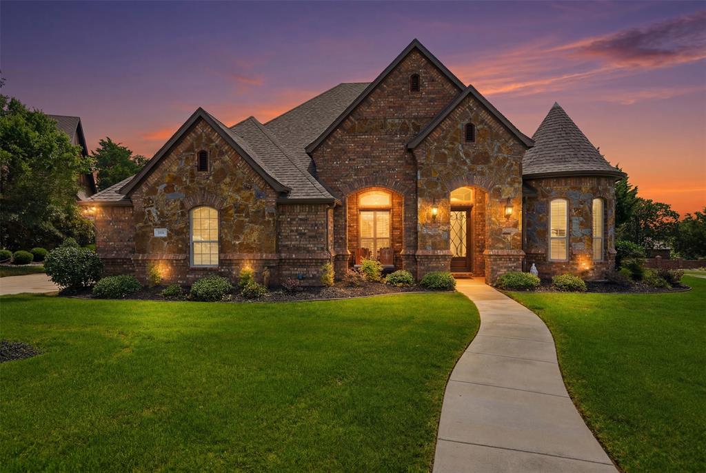 Experience exceptional luxury living in the highly sought-after Bourland Oaks Addition of Keller. Situated on a premium 0.40-acre corner lot within acclaimed Keller ISD, this stunning single-story residence offers 3,289 square feet of thoughtfully designed living space featuring 3 spacious bedrooms, 3 full bathrooms & an impressive 4-car garage. Designed for both everyday comfort & upscale entertaining, the heart of the home is a professional-grade gourmet chef’s kitchen complete with a built-in refrigerator, premium stainless steel Viking appliances, pot filler, custom cabinetry & expansive preparation space. The resort-style backyard is a true showpiece. Enjoy year-round outdoor living under the huge covered patio featuring a fully equipped Viking outdoor kitchen, misting system & seamless indoor-outdoor surround sound. The spectacular heated saltwater pool boasts a dive rock, raised spa & elegant waterfall feature, creating a private oasis perfect for relaxation & entertaining. Inside, generous living spaces are enhanced by high-end finishes, abundant natural light & a flowing open-concept layout that blends sophistication with functionality. This rare Keller gem combines luxury amenities, exceptional outdoor living & a prime location, offering an unparalleled lifestyle opportunity in one of the area's most desirable neighborhoods. Welcome home!