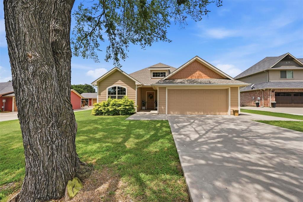 Welcome to effortless living in the highly sought-after gated community of Lake Kiowa. Built in 2021, this beautifully appointed 3-bedroom, 2-bathroom home with a dedicated office offers the modern finishes, thoughtful design, and low-maintenance lifestyle today's buyers desire. The heart of the home features an open-concept kitchen, living, and dining area that creates an inviting space for everyday living and entertaining alike. Stylish finishes, contemporary fixtures, and a bright, airy layout showcase the quality and craftsmanship throughout. The private office provides the perfect setting for working from home, hobbies, or a quiet retreat. Step outside to enjoy the quaint covered patio, where you can unwind and take in stunning sunset views overlooking the flat, grassy backyard. With plenty of room for games, pets, gardening, or outdoor gatherings, this backyard is designed for enjoyment of all kinds. Beyond the property, Lake Kiowa offers an exceptional lifestyle filled with recreation and community amenities. Residents enjoy access to the private lake, perfect for fishing, boating, water skiing, kayaking, paddle boarding, and more. Golf enthusiasts will appreciate the championship 18-hole golf course, 9-hole par-3 course, and dedicated chipping and putting practice areas. Additional amenities include two beaches, sports courts, walking trails, playgrounds, and a vibrant community atmosphere. Whether you're seeking a full-time residence or a weekend retreat, this move-in-ready home combines modern comfort with the unmatched lifestyle that makes Lake Kiowa one of North Texas' most desirable communities.