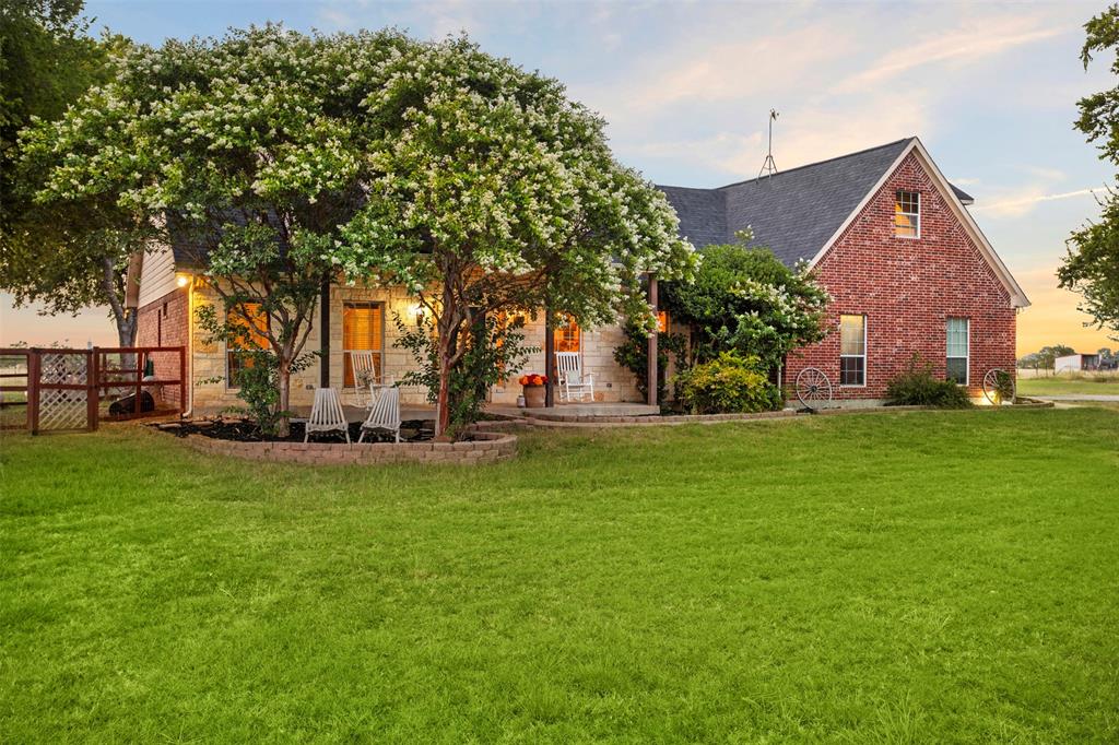This property is buzzing with opportunity! Set on just shy of 10 beautiful acres, this warm and inviting home offers the perfect opportunity to make it your own with personal updates and modern touches. The primary suite, along with two additional bedrooms, conveniently located on the main level, while the upstairs features a fourth bedroom, full bath, and spacious game room, providing an ideal retreat for guests or added living space. Enjoy your morning coffee on the welcoming front porch or unwind in the evenings on the covered back patio overlooking the beautiful landscape. The land strikes that hard-to-find balance with a perfect mix of mature trees and open pasture, providing shade, privacy, and plenty of usable space. Dreaming of farming or livestock? You’ll appreciate the 3-stall barn-shop with electricity and water, along with an additional 14 x 36 covered area for equipment, storage, or workspace. Adding to its unique appeal is a professionally managed honeybee colony. Whether you're excited to continue the sweet tradition or prefer to have the colony removed before closing, the choice is yours. If you've been searching for acreage with character, functionality, and room to grow, this is a property you won't want to miss. Come see for yourself if this home is meant to bee.