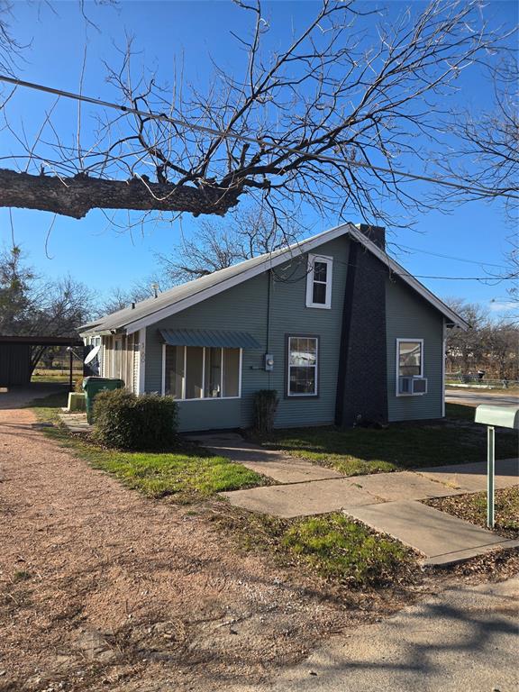 This 1,310 sq ft, 3-bedroom, 1-bath pier-and-beam home is situated on a large corner lot and offers excellent potential for updating or continued use as a rental property. The home features a metal roof and a large metal carport with additional storage, providing practical covered parking and workspace. A fully fenced backyard offers privacy and functionality, with additional parking access behind the fence—ideal for multiple vehicles, trailers, or equipment. With its generous lot size, flexible layout, and solid structure, this property presents a great opportunity for investors or buyers looking to add value.