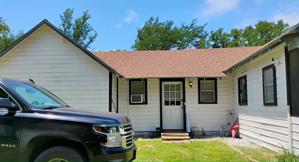 THIS  Sale Includes Lot 13 block 3 unit 1 with a 1200 square foot shop. Almost 1 acre total.Tranquil Setting across from lake Amon Carter.