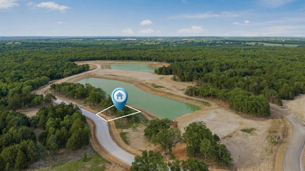 Build your dream home, weekend escape, or investment property in Rock Creek West, the newest and most exclusive addition to Rock Creek Resort on Lake Texoma. This gated, resort style community offers the perfect blend of relaxation and recreation with access to premier amenities including a private Jack Nicklaus designed golf course, clubhouse dining, marina, resort pool, fitness center, spa, and year round events. Enjoy access to the scenic 14 mile lakeside trail, recognized as Texas’ #1 trail by Trail.com. Rock Creek West features exciting planned amenities including two private lakes, a swimming beach and picnic area, bathhouse, private pool, kayaks and canoes, basketball, tennis, pickleball, and more. Enjoy the freedom of no required build timeline, a 750 sq ft minimum build, and the ability to choose your own builder or select from approved custom builders. Short-term rentals are allowed in this phase, creating excellent personal use or income potential. Located just about one hour north of DFW, this is a rare opportunity to own in one of North Texas’ fastest-growing lake communities. Club dues included with lot purchase until June 2029!!