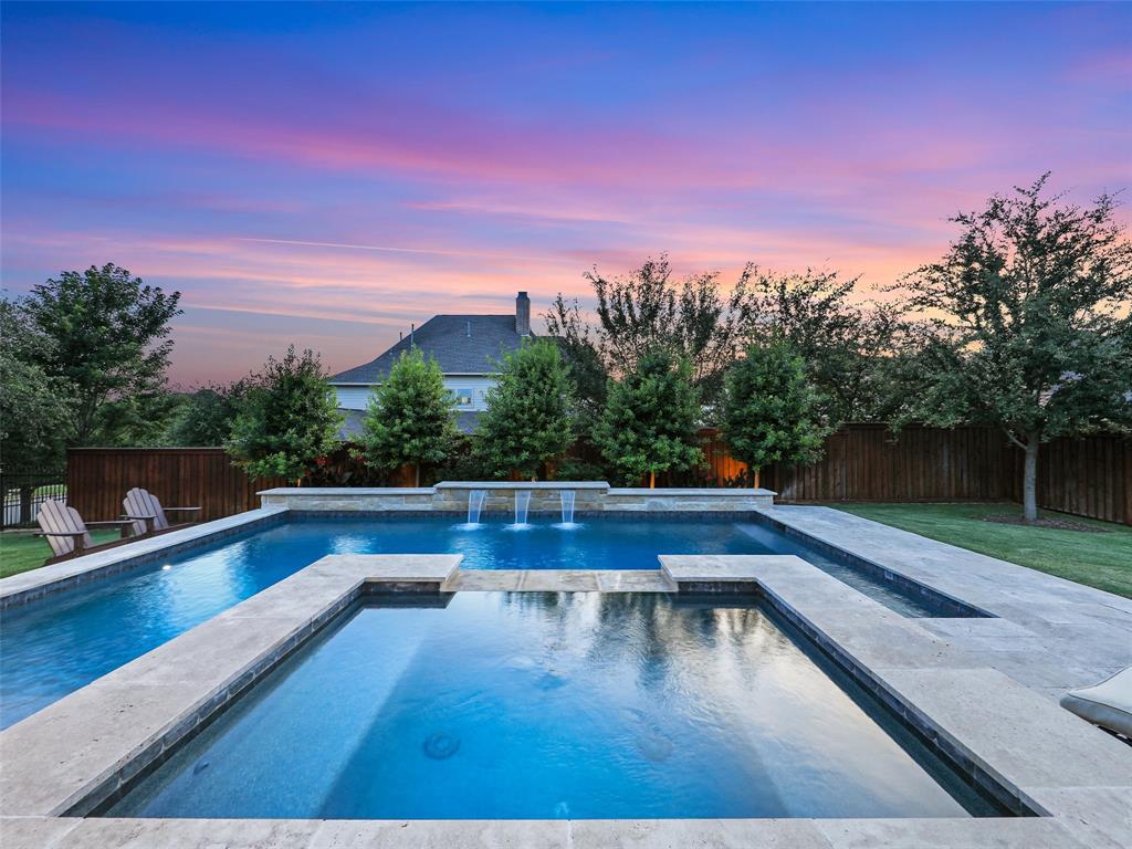 Step into this beautifully appointed home featuring an open floor plan designed for both everyday living & entertaining. The chef’s kitchen is equipped w-a commercial-grade gas cktp, built-in refrigerator & microwave, double oven, custom vent hood, & a new dishwasher. Just off the main living areas, an impressive wine cellar showcases a custom-built 800-bottle mahogany rack system, Cellar Pro 4000S split cooling unit, multiple zoned lighting w-dimmers & custom iron door. The dining rm is highlighted by 8-ft custom paneling a Restoration Hardware light fixture, accent paint added in 2022 & a trimmed archway, adding architectural detail and charm. The 1st floor media rm w-a wet bar will be great for entertaining. Plantation shutters enhance the interior, while thoughtful upgrades provide comfort and efficiency, including a Rinnai gas tankless water heater & a whole-house Aqua sauna Rhino water filtration system & a salt-free water softener. Major exterior updates include a new Class 3 laminate shingle roof, gutters, & flashing (2025), refinished wrought iron fencing (2024), & garage door coils & rollers replaced in 2024. HVAC systems have been professionally maintained every six months, w-coils updated in 2023.The backyard is designed for relaxation and entertaining, featuring a Foley's Custom Gunite heated pool & 10-person hot tub built by Foley Pools in 2022.Travertine limestone decking and coping surround the pool, complemented by a grilling area and custom fireplace constructed of 100% Lueders limestone. Pentair pool equipment w-wireless controls provides convenient operation. A roof extension over the patio is internally trimmed w-stained cedar for a refined finish. Mature Holly, Magnolia, & Oak trees enhance the landscape, creating a private outdoor setting. Split 3 car garage has footprint of a 5 car garage due to bonus landings in both garage locations. Corner internal lot on cul-de-sac, very little traffic