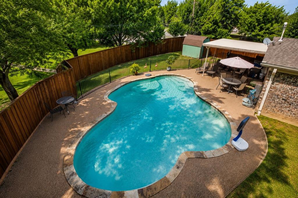 This magnificent oasis in the highly sought-after North Richland Hills is ready for its next owner. Situated on an oversized lot, this home boasts a gated pool and a covered backyard patio, making it ideal for summer gatherings and hosting family events.

The interior features four bedrooms, three bathrooms, and three expansive living areas, providing ample space for entertaining. The contemporary kitchen is a standout, equipped with stainless steel appliances, lazy susans, and a decorative backsplash. Additional highlights of this Birdville ISD masterpiece include a beautiful full-brick fireplace, enormous bedrooms, and the benefit of no HOA.

Centrally located with convenient access to Highways 183, 820, and 121, this property is just 25 minutes from DFW International Airport and AT&T Stadium. This exceptional home will not last long—schedule your viewing today.