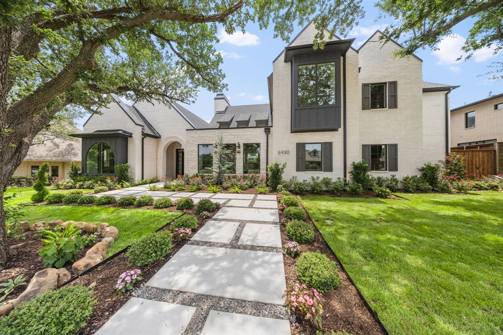 Situated on an expansive, tree-lined lot in the heart of Preston Hollow, this extraordinary custom residence is a showcase of timeless architecture, exceptional craftsmanship, and elevated luxury. Thoughtfully designed with soaring vaulted ceilings, exposed wood beams, and exquisite custom millwork throughout, every space has been curated with both beauty and functionality in mind.

The grand living spaces flow effortlessly into a chef's kitchen appointed with Wolf appliances, a Sub-Zero refrigerator, Taj Mahal quartzite countertops, and custom cabinetry. Entertain with ease thanks to the impressive U-shaped butler's pantry featuring a sink, double ovens, warming drawer, and abundant prep and storage space.

The first-floor primary suite is a true private retreat, complete with a sitting area, built-in coffee bar, separate custom his-and-hers closets, and a spa-inspired bath finished with luxurious materials and impeccable detail. A secondary en-suite bedroom on the main level provides the ideal space for guests or multigenerational living.

Upstairs, three additional en-suite bedrooms are complemented by an expansive game room with a wet bar, a second laundry room, and generous flex space designed for today's lifestyle.

Designed for effortless indoor-outdoor living, this remarkable Preston Hollow residence offers a rare combination of architectural character, premium finishes, and thoughtful amenities on one of Dallas' most coveted streets. Every detail has been carefully considered, creating a home that is as functional as it is unforgettable.