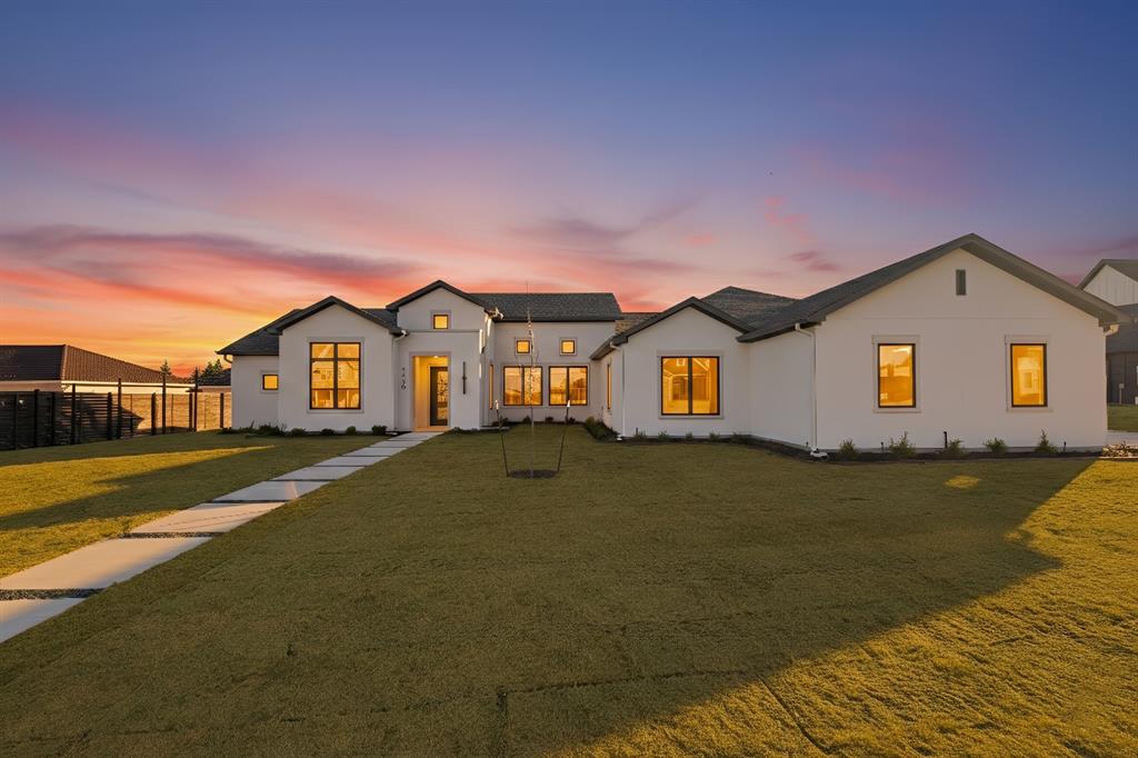 Step into refined Texas luxury at 4420 Azalea Way, a beautifully crafted Augusta Custom Home in the gated community of Azalea Hollow, nestled in the rolling hills of Midlothian. This thoughtfully designed 4-bedroom, 4-bath home spans 3,547 square feet on a sprawling 0.88-acre lot, offering both privacy and elegance.

Warm organic tones and natural textures set the tone, with white oak flooring, designer-curated tile selections, and a soft, neutral palette that flows throughout the home. The heart of the home is the stunning kitchen, anchored by a curved-edge island topped with luxurious Luce Oro quartz—perfect for gathering, entertaining, and everyday living.

Enjoy cozy evenings by the stucco and cast stone fireplaces—one indoors for intimate ambiance, and one on the covered back patio for year-round outdoor living.  Make this home yours with available custom add-ons including outdoor kitchen, garage floor tile system, full backyard sod, a pool, or outdoor living area. Check with agent for pricing. 

Located just minutes from the charm of historic downtown Midlothian and zoned to top-rated schools, this home offers custom craftsmanship in a peaceful, scenic setting.  Complete February 2026.