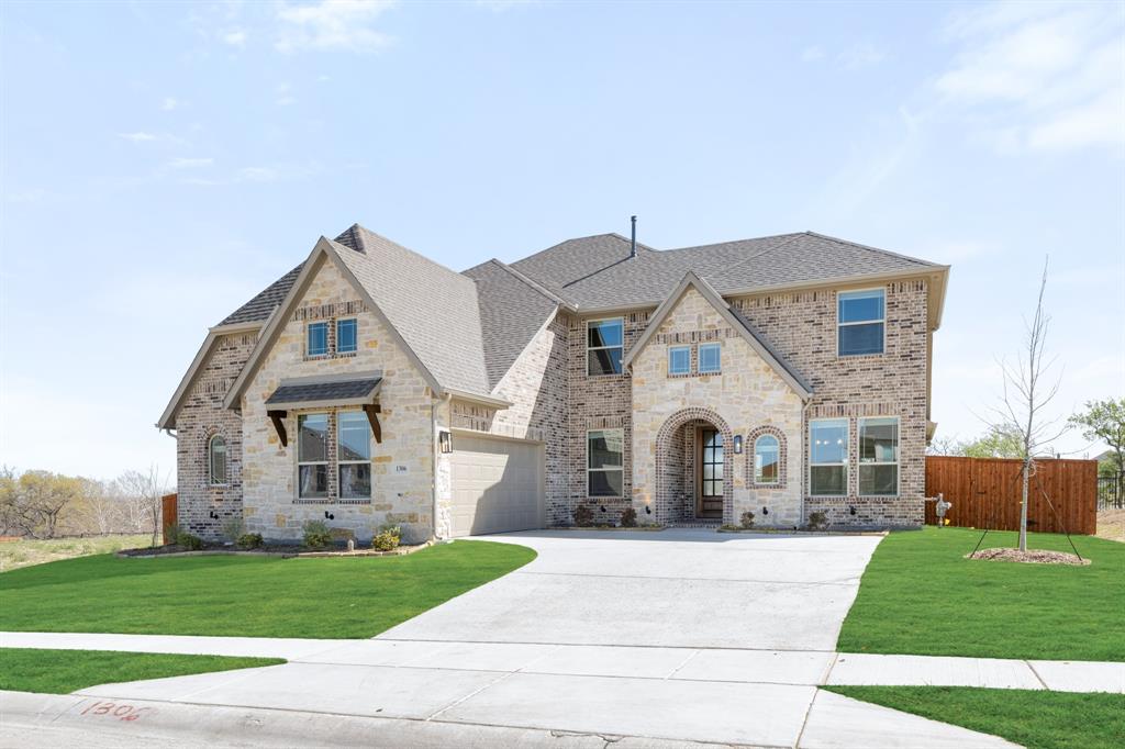 NEW! NEVER LIVED IN. Just finished construction! This Bloomfield Homes Seaberry offers 5 bedrooms, 4 baths, and a flexible two-story layout designed to maximize both shared spaces and private retreats. The brick and stone exterior is accented with exterior lighting, full gutters, and a welcoming covered front porch, creating strong curb appeal. An 8-foot front door opens into a spacious foyer with dual doors leading to a private study, setting a polished first impression. Wood flooring extends through much of the main level, guiding the layout into the central living area. The family room stands out with soaring ceilings and a dramatic floor-to-ceiling fireplace that defines the space and adds visual impact. The Deluxe Kitchen connects seamlessly and features quartz countertops, built-in stainless steel appliances, a large island, and a butler’s pantry that adds valuable prep and storage space. The primary suite is located on the first floor and offers a comfortable private retreat with a spacious bedroom, walk-in closet, and an enlarged shower. Secondary bedrooms and full baths are thoughtfully placed to support flexibility, including a first-floor bedroom with a nearby bath and additional bedrooms upstairs. The second floor opens to a game room that overlooks the living area below, adding another layer of usable space. Practical features include window blinds, a tankless water heater, a covered patio with a gas drop for future outdoor cooking, and a J-swing driveway leading to a 2-car garage. Located in the Timberbrook community in Justin, residents enjoy access to amenities including a park, playgrounds, dog park, community pool with pool house, and neighborhood trails. Visit the Bloomfield Homes model in Timberbrook to see the Seaberry come together and learn more about this community.