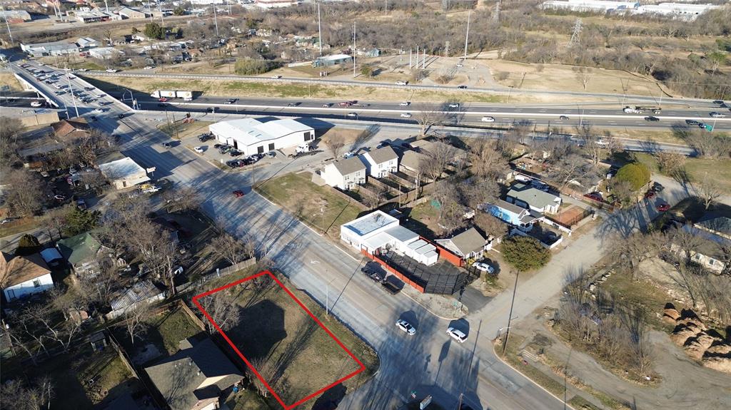 Commercially zoned E lot located off Riverside Dr & E Tucker St in Fort Worth, offering a prime opportunity for investors or small business development. This 6,450 sq ft parcel is conveniently situated near major transportation corridors with quick access to I-30 and US-287. Surrounded by established neighborhoods and ongoing area growth, the property provides strong potential for neighborhood-serving commercial uses. Ideal for office, retail, service, or other permitted uses under E zoning (buyer to verify). Excellent location with proximity to downtown Fort Worth and key highways makes this an attractive long-term investment. Buyer to verify zoning, utilities, permitted uses, and development requirements with the City of Fort Worth. Property Lines in the pictures are approx. There is no property survey. Buyer to pay for one if needed.