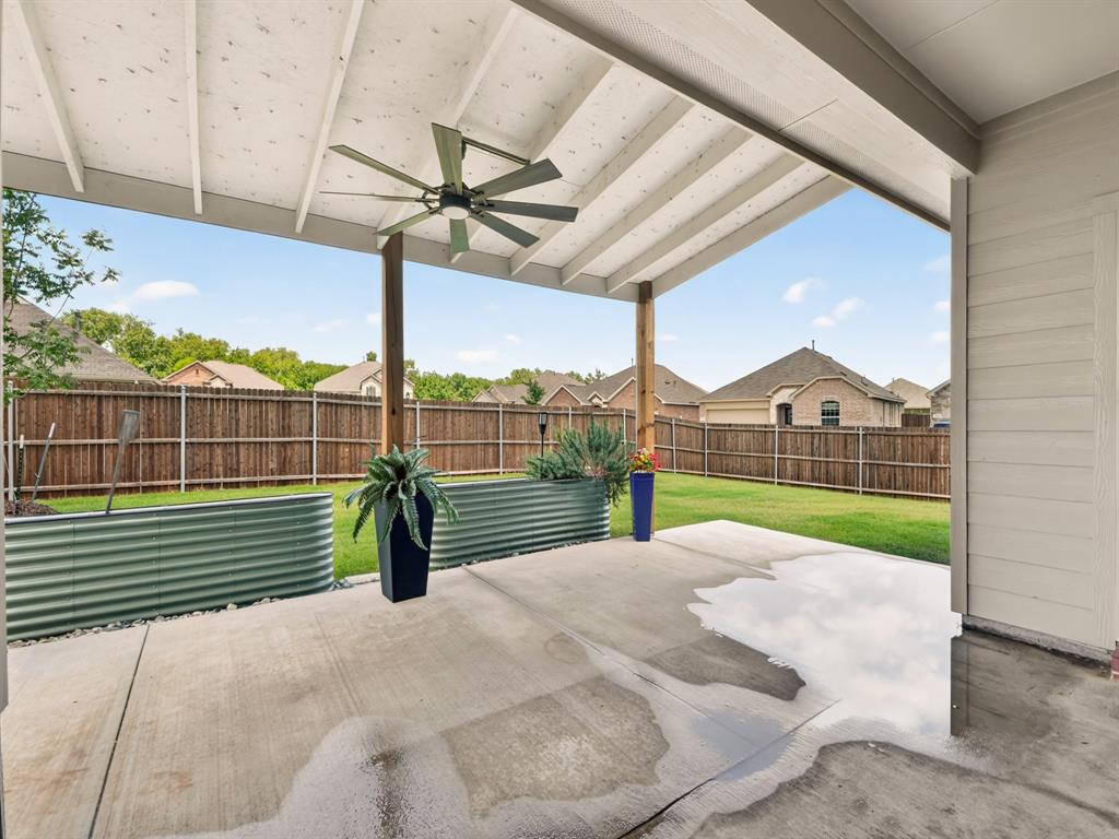 * NO PID or MUD Taxes ** BIG 24 x 16 COVERED PATIO overlooking HUGE Pool sized private backyard on the CORNER ** Barley Lived in WITH many IMPROVEMENTS ** Open-concept floorplan perfect for entertaining and everyday living * Large OPEN Dining Area * Perfectly designed SPLIT-BEDROOM layout offers privacy with 4 bedrooms separated into three distinct areas ** Designer touches throughout include PLANTATION SHUTTERS and quartz countertops  ** Neutral light-and-bright colors ** Luxury wood-like FLOORING THROUGHOUT DOWNSTAIRS only carpet upstairs (NEW 2026) ** The kitchen is equipped with a gas range and convenient motion-activated faucet ** Upstairs, enjoy an OVERSIZED 19x15 GAMEROOM ideal for a media room, playroom, home office OR EXTRA 5th BEDROOM ** The GARAGE features professional HIGH-END STORAGE cabinets and overhead shelving solutions ** Step outside to relax under the huge covered patio *Backyard SHED STAYS with Property PLUS the 2 raised garden beds are all ready for new plantings ** Residents enjoy an outstanding community with a park and playground, resort-style POOL with LAZY RIVER, covered picnic areas, fire pits, grills, and LOW HOA dues!