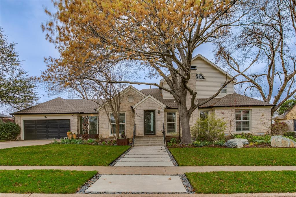 On a storybook, tree-lined lane in coveted Stevens Park Estates, this architectural gem stands as a rare offering in one of Dallas’ most cherished enclaves. Equal parts timeless and boldly modern, the home unfolds with effortless elegance—where expansive living spaces are artfully balanced with intimate moments, perfect for both grand celebrations and quiet evenings at home. Taken to the studs in 2019, the residence was completely reimagined with meticulous attention to detail. The result is a home that feels both iconic and refreshingly current, showcasing sophisticated finishes, state-of-the-art systems, and an abundance of natural light that pours in from every angle. Two striking living areas set the stage for memorable entertaining, while a private office and an upstairs exercise retreat provide the flexibility today’s lifestyle demands. At the heart of the home, the chef’s kitchen makes a dramatic statement—anchored by a stunning quartz island and appointed with a full Dacor appliance suite. Dual wine captains, an ice maker, coffee bar, custom seamless cabinetry, and generous storage make entertaining both effortless and elegant. The primary suite offers a true sanctuary, featuring a serene, spa-inspired Zen bath designed for moments of quiet retreat. Two beautifully appointed guest suites ensure comfort and privacy for family and visitors alike. Outdoors, picturesque gardens and a gently murmuring koi pond create a private oasis—lush, tranquil, and utterly enchanting. Beyond your gates, the very best of North Oak Cliff awaits, with close proximity to Stevens Park Golf Course, the vibrant Bishop Arts District, and Trinity Groves—home to beloved boutiques, acclaimed dining, and the culture that defines one of Dallas’ most dynamic neighborhoods. This is more than a home. It’s a retreat, a statement, and a little bit of everyday magic—perfectly placed.