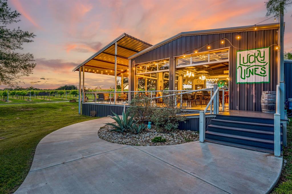 Welcome to Lucky Vines Winery and Brewery, a stunning 20-acre property perfect for your vineyard dreams! This charming estate features 7.5 acres of flourishing vineyards, cultivating a variety of premium grapes. Equipped with state-of-the-art winemaking and brewing equipment, along with cold storage for kegs, it’s a turnkey operation for wine and beer enthusiasts.

The inviting tasting room boasts outdoor seating on a lovely patio, ideal for guests to sip and savor the flavors of your creations. With restrooms and a small kitchen for food prep, you can easily host events, parties, or live music performances using the portable stage.

Additionally, a charming 3-bedroom, 1-bath home with the potential to be made into a short-term rental or bridal suite. Don’t miss this unique opportunity to own a vibrant winery and brewery, where the possibilities for growth and enjoyment are endless!