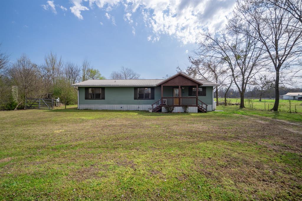 Beautiful 3-bedroom, 2-bath home sitting on 1.437 acres. This pier-and-beam home offers an open floor plan with a spacious living area featuring built-ins, a dining space that flows easily into the kitchen for everyday cooking and entertaining. The primary suite includes a private bath, and the additional bedrooms are comfortably sized with plenty of natural light. Enjoy over 700 square feet of covered outdoor space between the inviting front porch and the large rear patio; perfect for relaxing and taking in the peaceful surroundings. A pond sits at the back of the property, adding to the scenic country view. The fenced acreage creates opportunities for outdoor enjoyment, gatherings, and a variety of livestock or agricultural uses. Located within Como Pickton ISD and only a short 10 minute drive to local dining, conveniences, and highway I-30, this property offers the space and setting to enjoy country living with easy access to town.