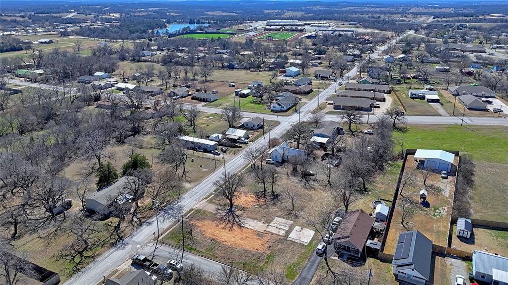 This property has so much potential and offers many possibilities. It is a great location within the Bowie City Limits and is zoned for residential and multi-family use. The lot is situated on the corner of South Mill Street and Clay Street. The original, older homes have been cleared but some of foundations remain. City utilities are available to support future development. The location is just minutes from city schools and area college.  It is also convenient to the main thorough fare through town that takes you to restaurants and shopping.