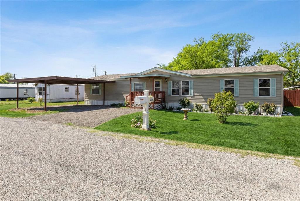 Charming 4-Bed Double-Wide on a Double Lot – Lake Granbury Access! Well-maintained and move-in ready, this beautiful 4-bedroom, 2-bathroom double-wide mobile home features a spacious open floor plan that's bright, airy, and perfect for relaxed living or entertaining.  Set on a generous double lot in a quiet, peaceful subdivision with Lake Granbury access—just a short walk to the neighborhood boat launch for easy boating, fishing, and lake enjoyment.  Pride of ownership shows throughout this very well taken care of home in a serene community. Ideal for year-round living or a peaceful lake getaway!Ready for its next owner—don't miss out!