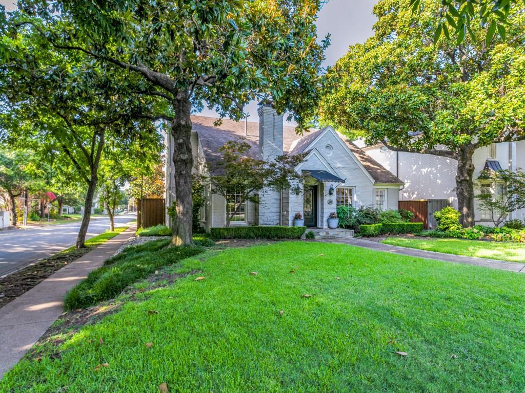 Updated and expanded 4 Bedroom home on a 63 x 160 corner lot. Great location and feeding into Boone Elementary.  Wood floors upstairs and down. Formals are large and feature fireplace and floor length windows. Continuing down the center hall, a large addition includes an open kitchen and den with a wall of french doors to the rear Verandah, sparkling pool and play area.  The open kitchen features slab granite counters, center island and gas cooktop.  Every bedroom has a private bath.  One large bedroom suite is downstairs and could be used as a playroom.  The primary and two more bedroom suites are located upstairs as well as a utility room. The spacious primary bedroom has large windows with sylvan views, large primary bath with separate vanities, jetted tub, and separate shower.  The primary closet is exceptionally large as well. The detached garage has extra storage possibilities. Final cleaning is being done. Active status begin Tuesday July 16 after 12:00 Noon.