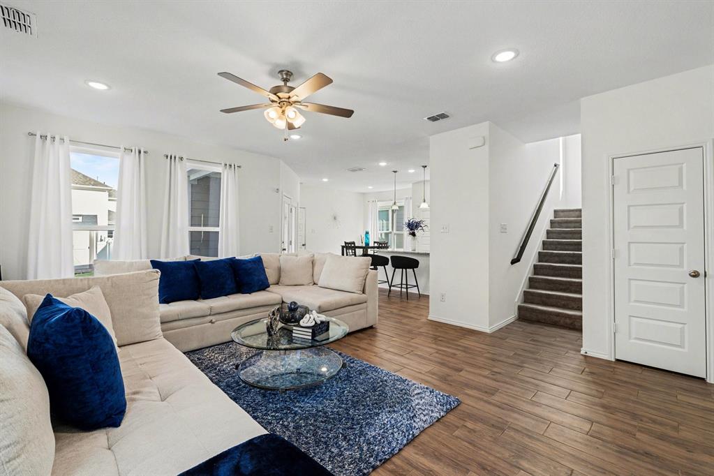 Built in 2022 by History Maker, this beautifully designed home in Liberty At Providence Village offers a unique and highly functional floor plan featuring 4 bedrooms plus a dedicated study. A private first-floor guest suite provides the perfect space for visitors or multi-generational living.
Step inside to find abundant natural light, modern finishes, and an open, inviting layout ideal for both everyday living and entertaining. The stylish kitchen and living areas flow seamlessly, creating a bright and welcoming atmosphere throughout. In addition to the dedicated dining space you will find extra seating at the kitchen island with pendant lighting. Upstairs you will find a spacious primary bedroom with luxurious en suite bath complete with double sinks, garden tub and separate shower. Secondary bedrooms are split and share another full bath.
Enjoy morning coffee or evening relaxation on the charming front porch, adding to the home’s curb appeal and character. Covered back patio looks out to the fenced yard with added storage shed. Enjoy all of the new shopping and dining options in this fast growing community including Sprouts, Kroger, Costco and more! Aubrey ISD