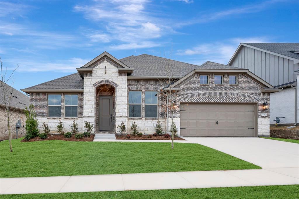 Welcome to this incredible Geneva located in the highly sought-after master-planned community, Elevon in Lavon. This thoughtfully designed single-story home offers 4 bedrooms, 3.5 bathrooms, a private home office, media room, and a 3-car tandem garage across approximately 2,843 square feet of modern living space. 

Step in to an open-concept layout featuring a spacious great room with a cozy fireplace that flows seamlessly into the dining area and chef’s kitchen. The kitchen is designed for both everyday living and entertaining, complete with a large kitchen island, gas cooking suite, wall oven, and an oversized walk-in pantry. The primary suite is a true oasis, highlighted by two walk-in closets and a luxurious bath with a freestanding soaking tub and separate shower. A dedicated office with stylish double barn doors sits just off the foyer—perfect for working from home. Enjoy movie nights or game days in the separate media room, offering flexible living space for entertainment or relaxation.

Outdoor living is just as impressive with a 16’ x 14’ covered patio overlooking the backyard—ideal for hosting gatherings or enjoying peaceful evenings outside. The entire community is perfectly positioned in a rapidly-growing location off Highway 78. With a vast array of impressive amenities, including a pool, walking trails, playground, and more, and a wide variety of shopping and dining set to open nearby, Elevon is the premier location to plant your roots.