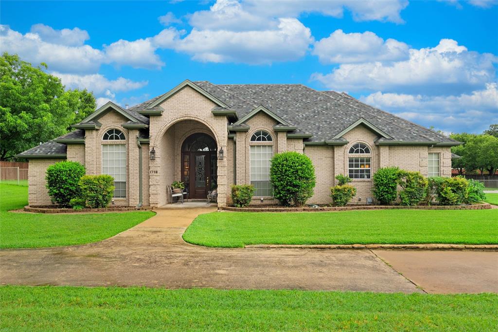 Wow, Welcome to 1718 Wanda Way, a rare chance for generational living.  We offer a 3,500+  sq ft main home, a detached 700+ sq ft guest house, an oversized 1.66 acre lot, 3 car garage, in ground pool and as an added bonus, all bedrooms are on the first level. Our stately entrance is accented by an elegant living with hardwood floors, fireplace, built-ins and a wall of windows pulling the outside in. What a perfect spot for your own study or even a piano room, the adjacent formal dining also with wood floors can handle the largest of tables. Our king size island kitchen offers endless counter and storage space, granite tops, stainless steel appliances, double oven, pantry, breakfast bar, built-in fridge and a spacious breakfast area for your morning coffee. Opening off the kitchen you will find an inviting living area perfect for entertaining or just relaxing. Our primary bedroom offers loads of floor space and ensuite bath with jetted tub, separate shower and vanities, with his and her walk-in closets. Rounding out the east side of the home you will find 2 more spacious bedrooms with a jack and jill bath, perfect for the kids. Continuing on the first level you will find a split 4th bedroom with adjacent full bath with access to the pool area. Our 2nd level offers a private man cave for those game nights, an additional hobby room, 5th bedroom, storage, or whatever you choose. Now onto our detached guest house, perfect for the live in parent, guest or teenager, quality shows throughout. A 16'x14' bedroom, large private bath, and walk in closet, which offers a full service kitchen with range, dishwasher and fridge. The den offers windows galore so you can enjoy the tranquil back yard. Speaking of back yard, this 1.66 acre lot offers endless possibilities for fun. Our pool area is perfect for those hot summer days.4th full bath is in the guest house.Floor plans of house and guest house are in the media section.