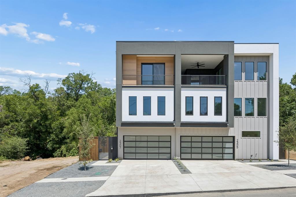 Welcome to 2305 Kings Rd, a stunning duplex-style single-family home in the heart of Dallas! This exquisitely designed property offers 1,938 square feet of contemporary living, featuring 3 bedrooms, 3.5 bathrooms, all thoughtfully designed with modern luxury in mind.

Step inside to discover a spacious floor plan with an abundance of natural light streaming through dual pane, oversized, and floor-to-ceiling windows. The home blends modern elegance with functionality, highlighted by beautiful hardwood-laminate and tile flooring throughout. The gourmet eat-in kitchen boasts premium counters, a gas stove, stainless steel appliances, a pantry, and a large island perfect for hosting or meal prep, all while enjoying the scenic views through the windowed layout.

Relax in the cozy living area with a charming fireplace, or retreat to the sumptuous primary ensuite, complete with separate vanities, a walk-in closet, a soaking tub, and a separate shower. The additional bathrooms feature oversized vanities, dedicated storage, and stylish finishes. A convenient powder room and foyer add to the home’s thoughtful design.

The private courtyard-like fenced yard, and Juliet balcony off the primary bedroom offer multiple options for outdoor enjoyment, while smart irrigation and rain gutters provide low-maintenance convenience. With brand new everything and builder warranties ready, every detail has been considered for your comfort and convenience.

Don’t miss this opportunity to own a truly remarkable home in a prime location! Schedule your showing today and experience the perfect blend of style and function at 2305 Kings Rd.