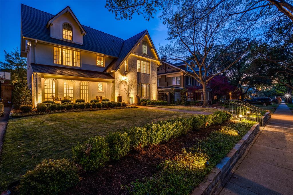 Stylish, sensational, classic-yet-updated Tudor retains its Old Highland Park charm but is now a turnkey opportunity just a block and a half from Armstrong Elementary. Built in 1922, taken to the studs in 2003 per previous owner, updated by the current owners in 2021-22, touching nearly every floor, ceiling, and wall surface. Gorgeous formals, and the open kitchen-breakfast-family room is so compelling, with great views to the pool area. All-new kitchen cabinetry, marble countertops, high-end appliances, walk-in wet bar off the dining room; all bath areas gutted, now feature designer finishes throughout. Spacious bedrooms, each with en suite bath area. The 4th BR is located on the 3rd floor, as is the roomy playroom-game room area. Plus a small basement perfect for wine storage. The pool and backyard were completely renovated as well, featuring artificial turf, outdoor cooking and dining areas, and a fun seating area at the rear. A luxurious 600 sf guest quarters sits atop the garage.